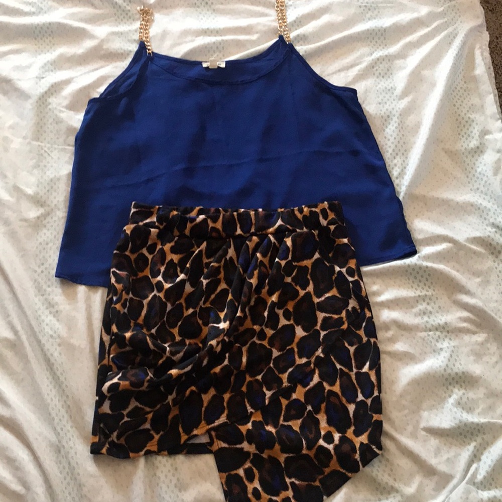 Blouse and skirt blouse is size L Skirt M